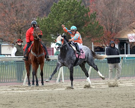 Paco Lopez tries to keep National Law from drifting out during his maiden win at Parx Racing