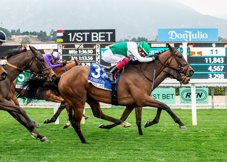 Mrs. Astor (No. 3) gets her nose in front to win the Robert J. Frankel Stakes at Santa Anita Park