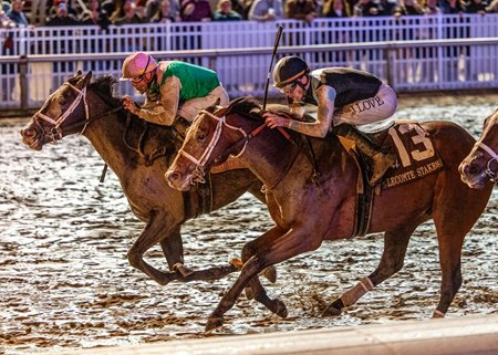 Disco Time rallies to win the Lecomte Stakes at Fair Grounds Race Course