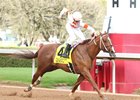 Booth wins the Whitmore Stakes at Oaklawn Park