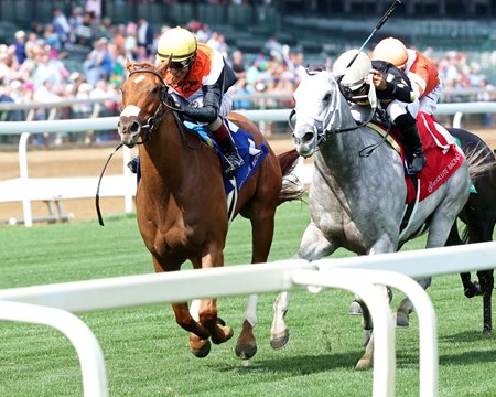 Bridle a Butterfly (outside) wins the William Walker Stakes at Churchill Downs