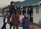Assistant trainer and exercise rider Bethany Taylor aboard Coal Battle at Churchill Downs as they prepare for the Kentucky Derby