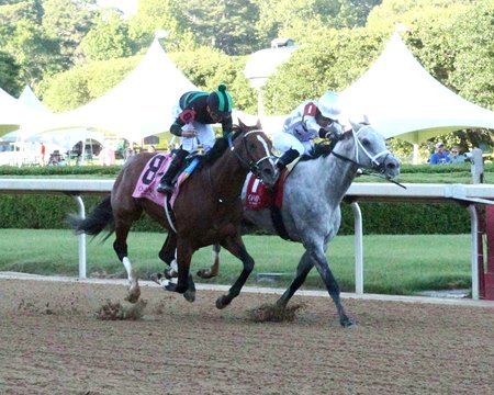 Saudi Crown (inside) defeats Mystik Dan in the Lake Ouachita Stakes at Oaklawn Park
