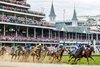 La Cara (7) leads Tenma (9) around the first turn in the 151st Kentucky Oaks at Churchill Downs. Eventual winner, Good Cheer (11), is towards the back in the blue cap, silks, and white  and blue blinkers.