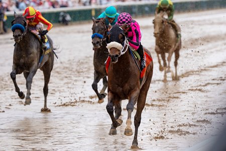 Macho Music wins the Pat Day Mile Stakes at Churchill Downs