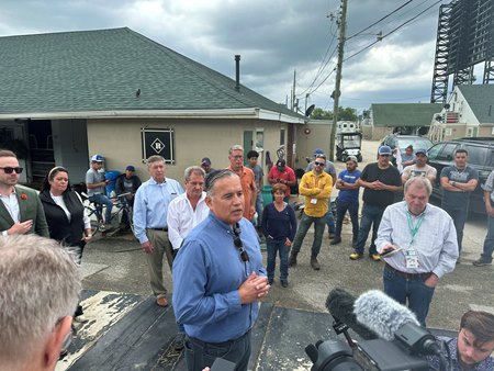 California Horse Racing Board vice president Oscar Gonzales talks with news media about immigrant worker issues in horse racing at Churchill Downs