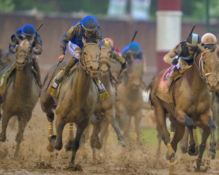 Junior Alvarado and Sovereignty make their move for the lead in the Kentucky Derby at Churchill Downs