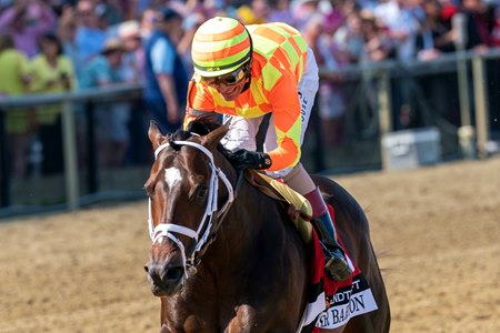 Crudo wins the Sir Barton Stakes at Pimlico Race Course