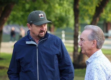 Hall of Fame jockey Jerry Bailey (right) talks to Journalism's trainer Michael McCarthy the day before the 2025 Preakness Stakes at Pimlico Race Course