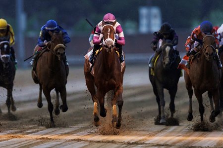 Look Forward (center) wins the Eight Belles Stakes at Churchill Downs