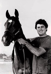Bernie Flint early in his training career with stakes-placed T. V. Knight