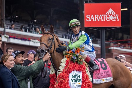 She Feels Pretty in the winner's circle after her victory in the 2025 New York Stakes at Saratoga Race Course