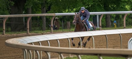 Sovereignty with exercise rider Neil Poznansky on the Oklahoma Training Track