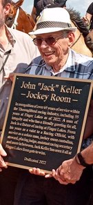 Jack Keller accepting the honor of having Finger Lakes' jockey room named after him