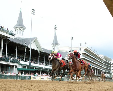 Will Take It (left) outfinishes Banishing to win the Hanshin Stakes at Churchill Downs