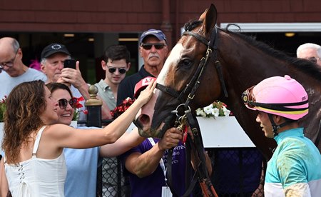 (L-R): Carrie Agne (in white), trainer Cherie DeVaux, and jockey Jose Ortiz celebrate after Dr. Agne's maiden win at Saratoga Race Course