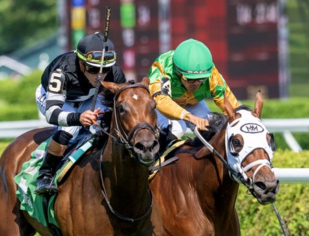 Sacred Goddess (left) earns the first victory for Icon Racing at Saratoga Race Course