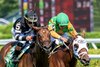 Sacred Goddess with jockey Irad Ortiz Jr., left holds off Trading Trouble with jockey Luis Saez to get the first win for Icon Racing which is headed by former Phillies baseball player Jayson Werth in the sixth race at the Saratoga Race Course  Thursday July 17, 2025  in Saratoga Springs, N.Y.  Skip Dickstein photo