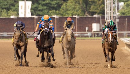 Mindframe (orange cap) wins the 2025 Stephen Foster Stakes at Churchill Downs