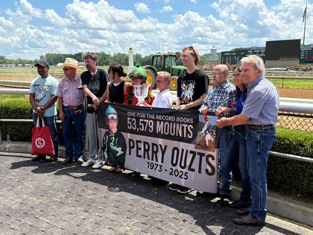Supporters join Perry Ouzts at Belterra Park to celebrate his achievement as the rides leader in North American racing history