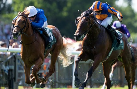 Distant Storm (left) breaks his maiden at Newmarket Racecourse