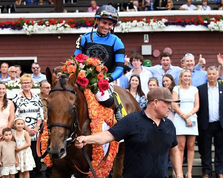 Excellent Truth in the Saratoga Race Course winner's circle after the Diana Stakes
