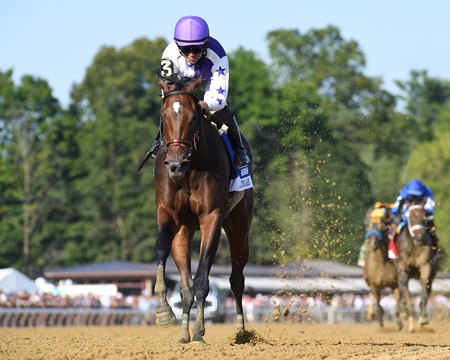 Scottish Lassie wins the Coaching Club American Oaks at Saratoga Race Course