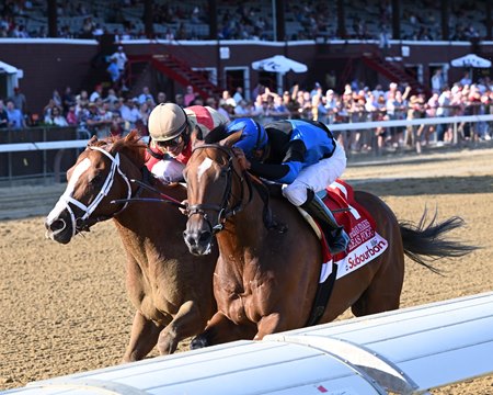 Phileas Fogg (inside) lasts for a head victory in the Suburban Stakes at Saratoga Race Course