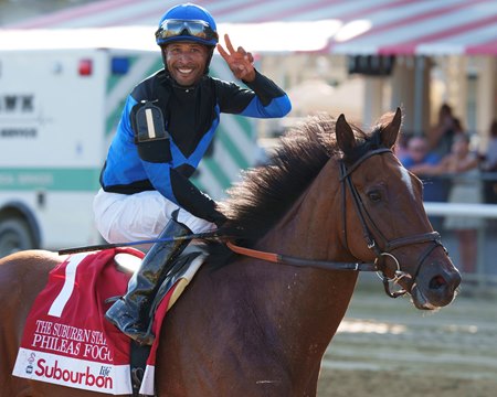 Phileas Fogg, under a smiling Kendrick Carmouche, after winning the Suburban Stakes at Saratoga Race Course