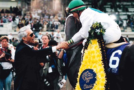 D. Wayne Lukas congratulates jockey Pat Day after his victory on Cat Thief in the 1999 Breeders' Cup Classic