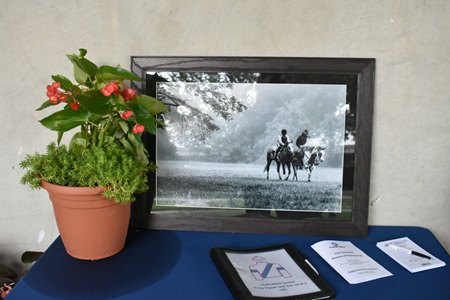 A display honoring D. Wayne Lukas during an equine dispersal in July at Fasig-Tipton