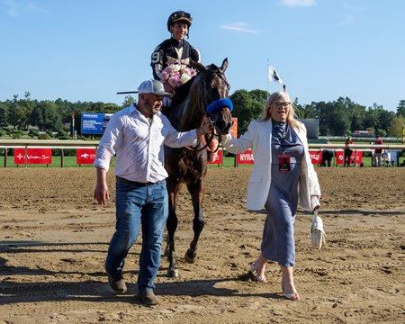Hope Road enters the winner's circle after the 2025 Ballerina Stakes at Saratoga Race Course