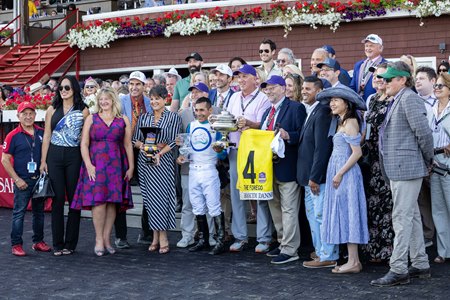 Connections of Book'em Danno in the Saratoga Race Course winner's circle after the Forego