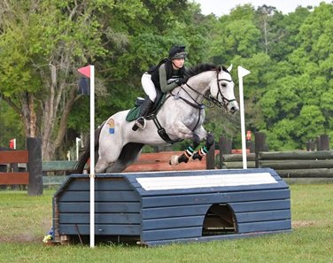 Abigail Bennett, one of two young rider award winners, guides her mount over a jump