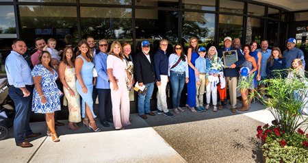 Smarty Jones' connections and fans gather outside the Humphrey S. Finney Sales Pavilion at Fasig-Tipton after the Hall of Fame induction ceremony in Saratoga Springs, N.Y.