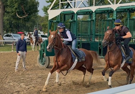 Trainer Miguel Clement watches as Go Go Boots (outside) and Loveontheleftbank break from the gate on the Oklahoma Training Track at Saratoga Race Course