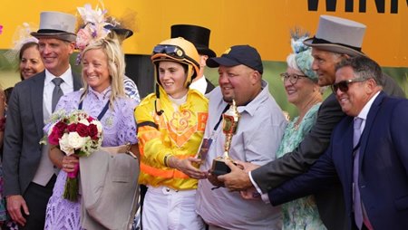 Al Ulwelling (right of jockey Pietro Moran) celebrates a victory from Mansetti in the King's Plate Stakes at Woodbine