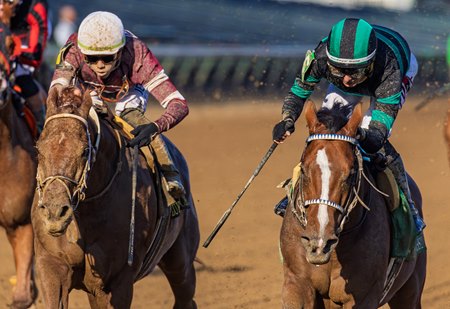 Mystik Dan (inside) outfinishes Disarm to win the Lukas Classic Stakes at Churchill Downs