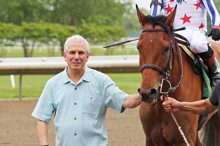 Joe Ioia with Mia's Crusade after a victory at Monmouth Park
