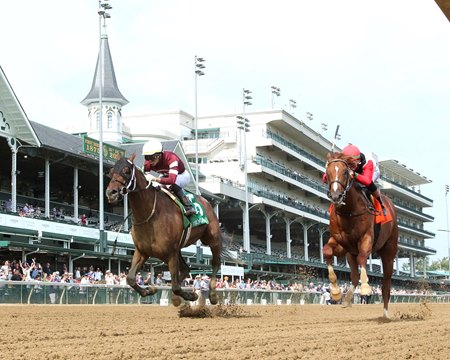 Spice Runner (left) wins the Iroquois Stakes at Churchill Downs