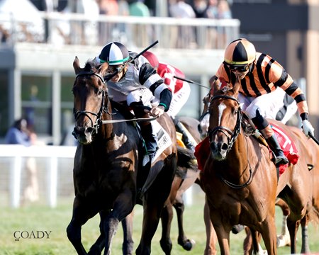 Troubleshooting (left) wins the Franklin-Simpson Stakes at Kentucky Downs