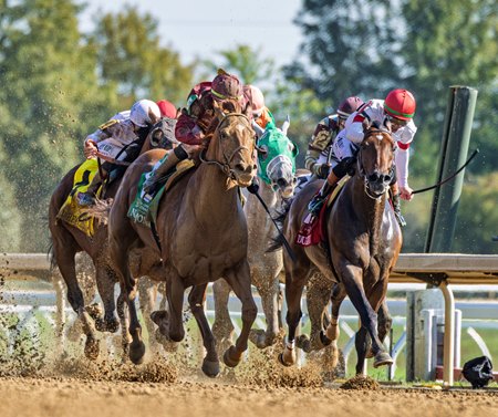 Nakatomi (outside) rallies to victory in the Phoenix Stakes at Keeneland