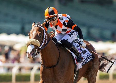 Intrepido, ridden by Hector Berrios, scores in the American Pharoah Stakes at Santa Anita Park