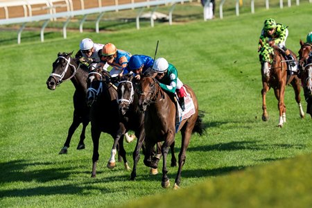 Imaginationthelady (inside) wins the Jessamine Stakes at Keeneland