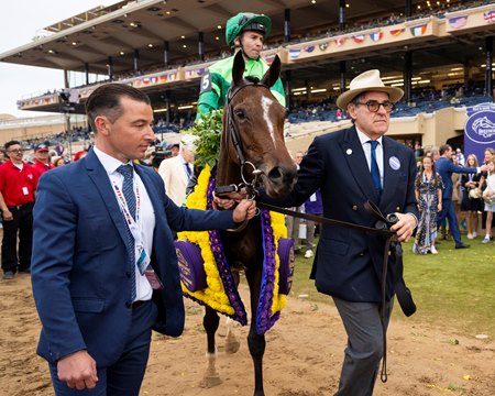 Owner Peter Brant (right) leads Gezora into the winner's circle at Del Mar after prevailing in the Breeders' Cup Filly and Mare Turf