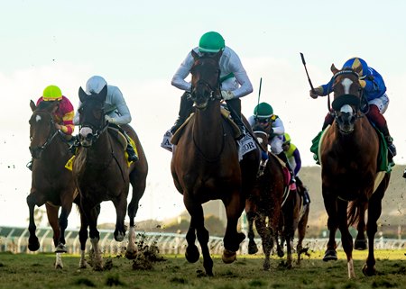 Umberto Rispoli (green cap) and Mrs. Astor win the Red Carpet Stakes at Del Mar