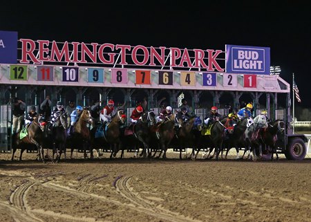 A large field breaks from the gate at Remington Park