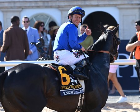 Junior Alvarado celebrates aboard Knightsbridge after winning the Fred W. Hooper Stakes at Gulfstream Park