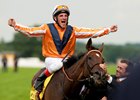 Danedream (Andrasch Starke) celebrates after winning the King George VI and Queen Elizabeth Stakes and greeted by trainer Peter Schiergen
Ascot 21.7.12 Pic: Edward Whitaker