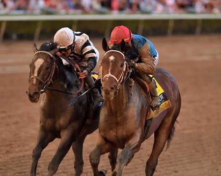 Commandment (right)  wins the Fountain of Youth Stakes at Gulfstream Park